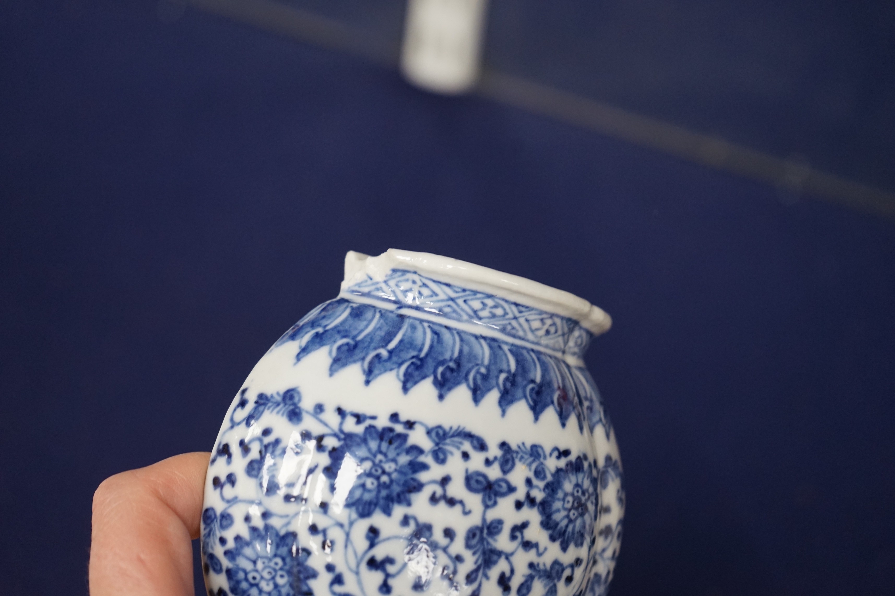 A Chinese blue and white wall vase shaped pocket, 19th century, 16.5cm tall